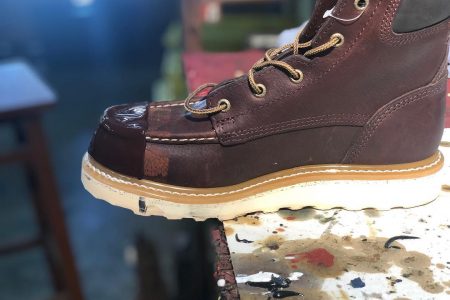 Brown Tuff Toe shown applied to brown moc toe work boot for protection.